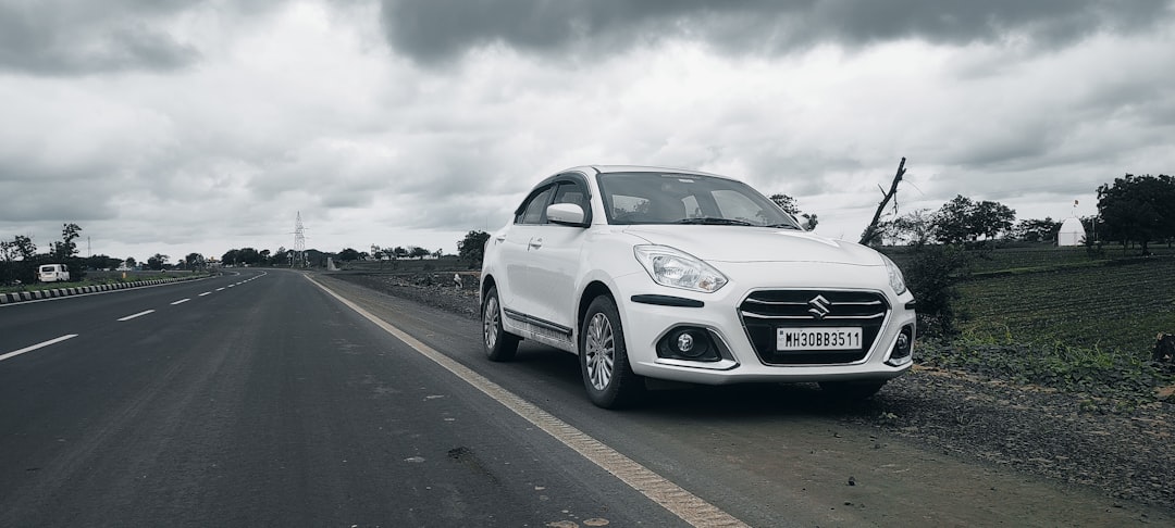 a white car on a road