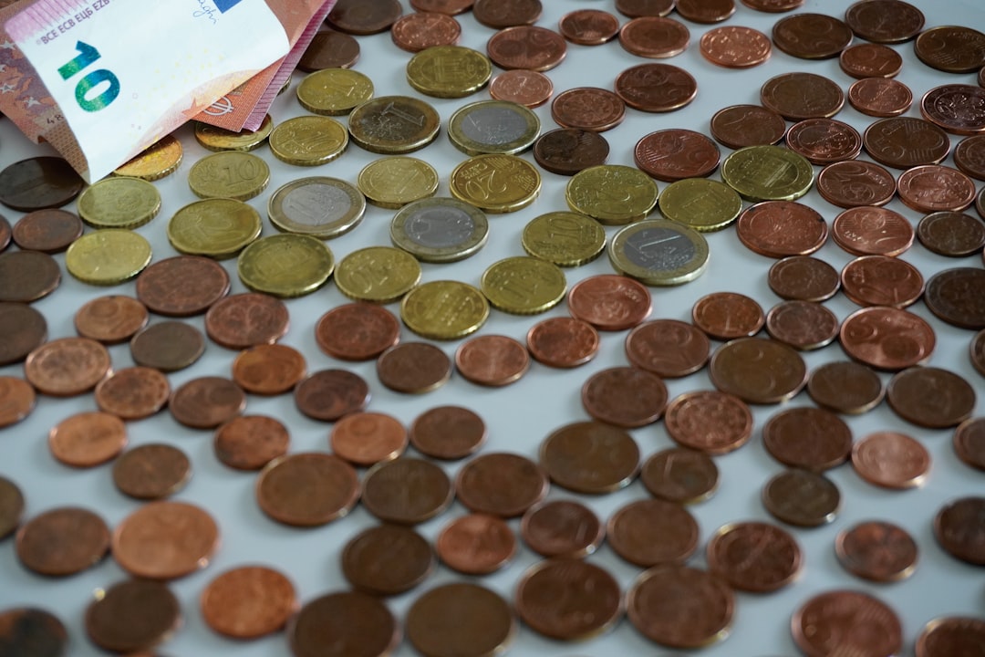 a pile of coins sitting on top of a table